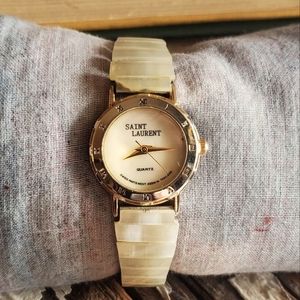 Ysl Vintage Saint Laurent Watch w/ mother of pearl stretch strap